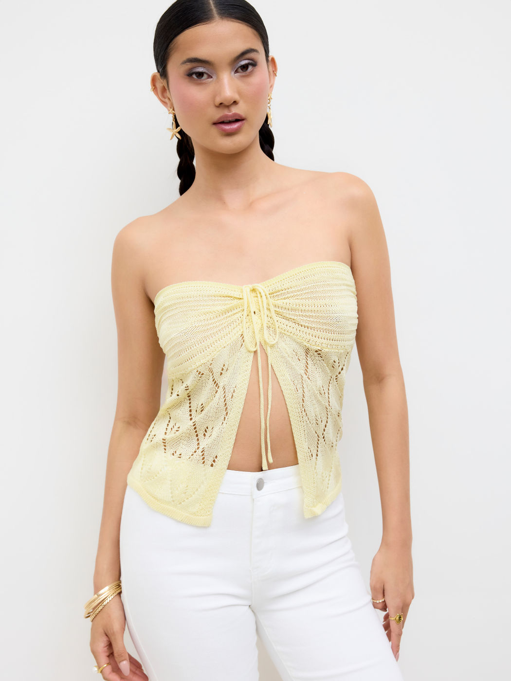 Top a fascia lavorata a maglia con nodo e spacco