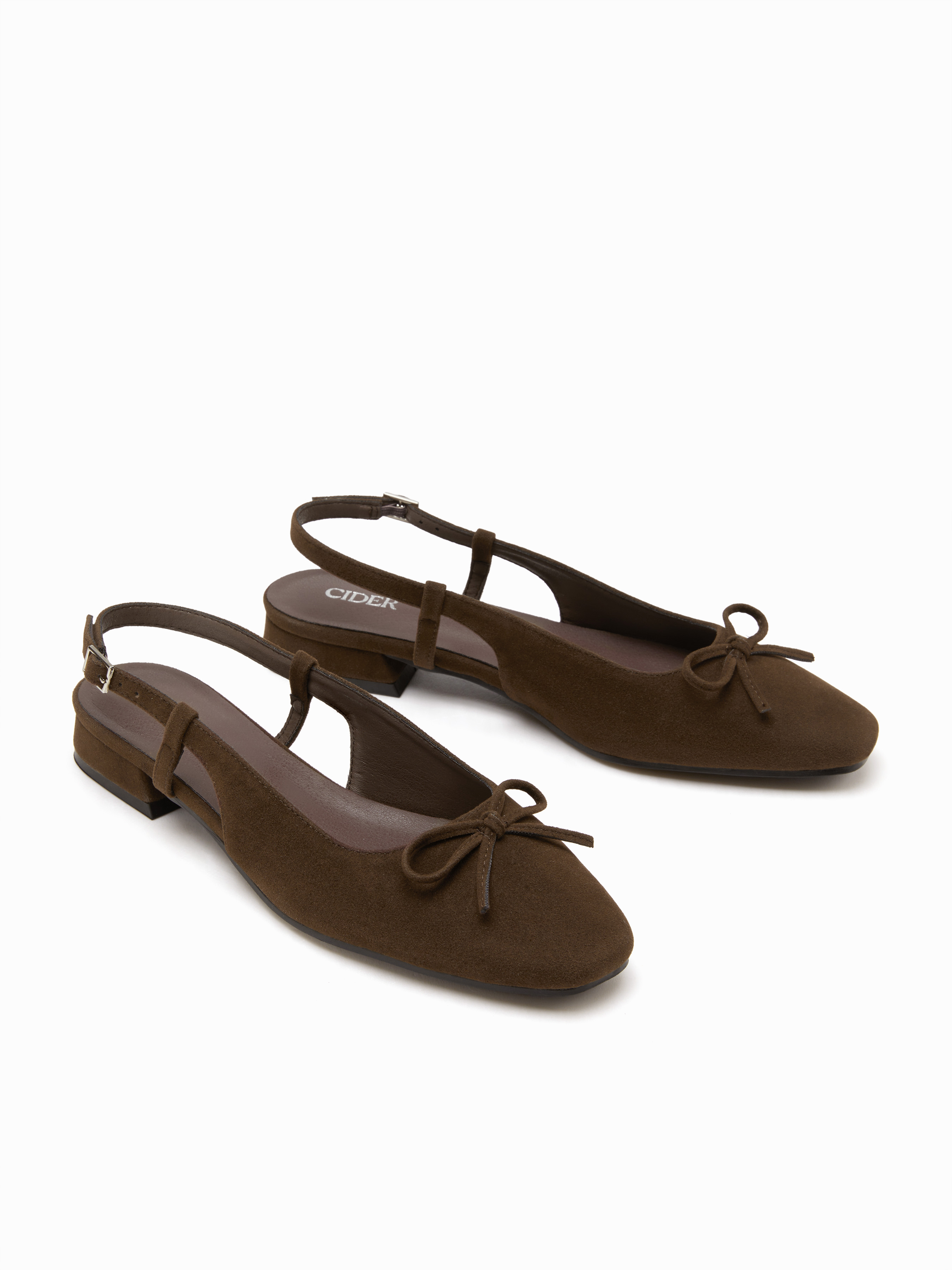 Ballerines en daim à talons escamotables avec nœud papillon