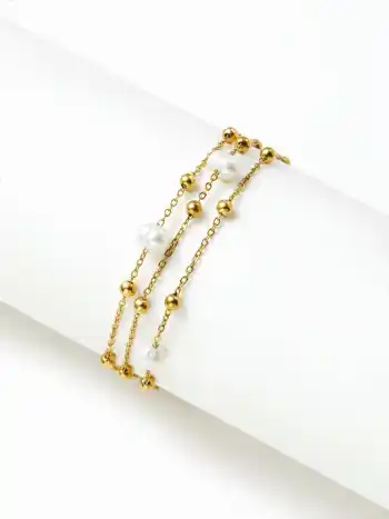 Mehrschichtiges perlenbesetztes Kettenarmband