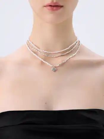 Geschichtetes Halsband mit Herz- und Faux-Perlen