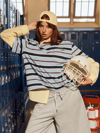 T-shirt oversize a righe in 100% cotone con bordi a contrasto e orlo a lattuga