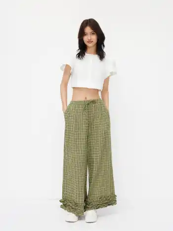 Pantaloni a vita media a quadri con coulisse e orlo a lattuga