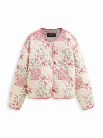 Giacca imbottita oversize con scollo a V floreale, bottoni e bordi a contrasto