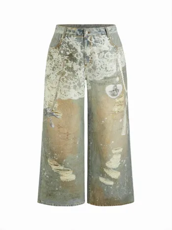 Jeans denim a vita bassa con pizzo, grafica, strappi e gamba larga Curve & Plus