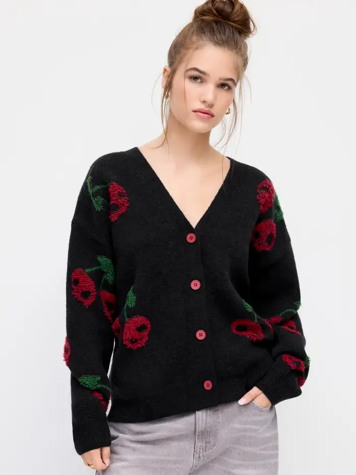 Haut en maille XXL aux motifs étoiles et lunes